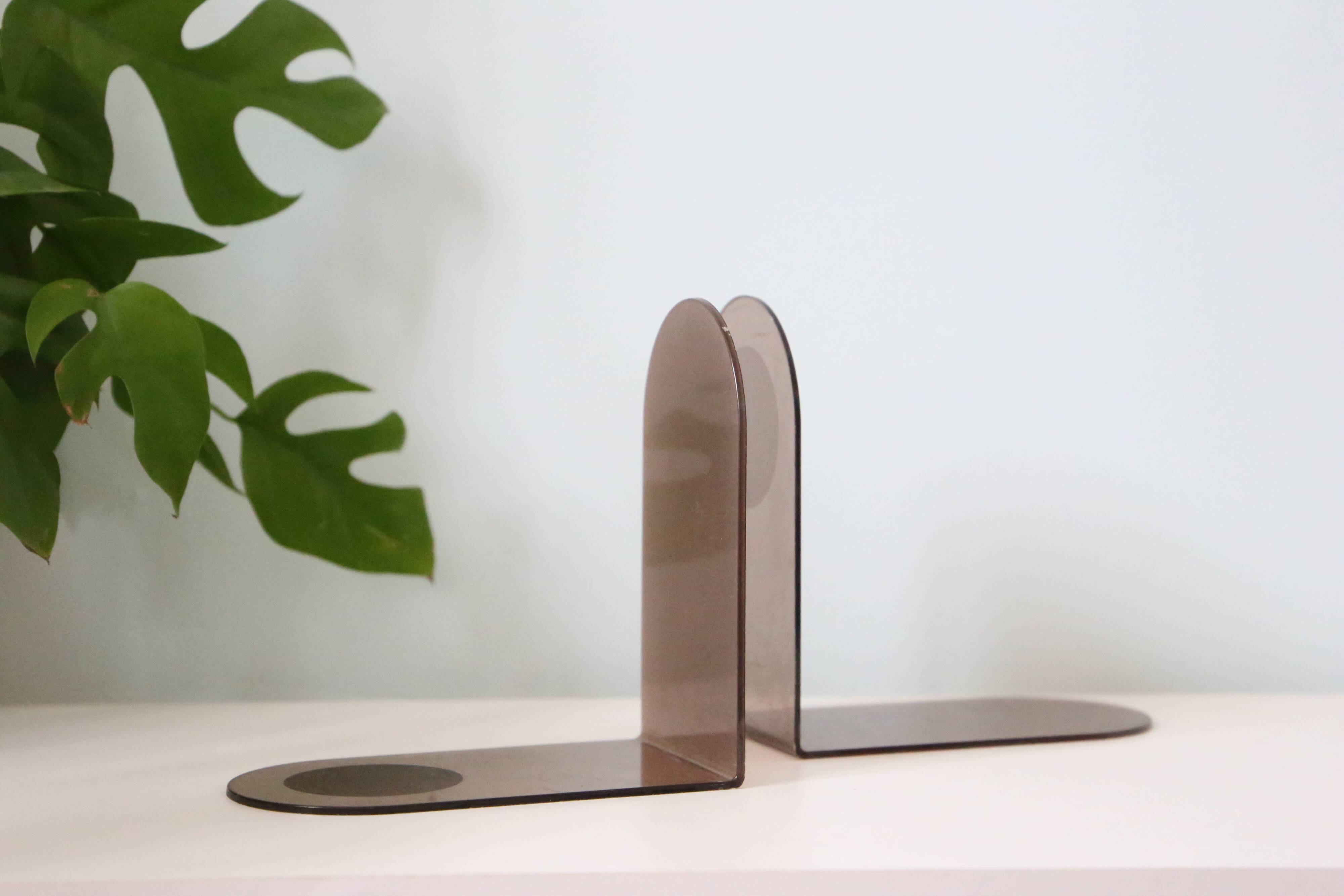 Pair of smoked plexiglass bookends, 1970s