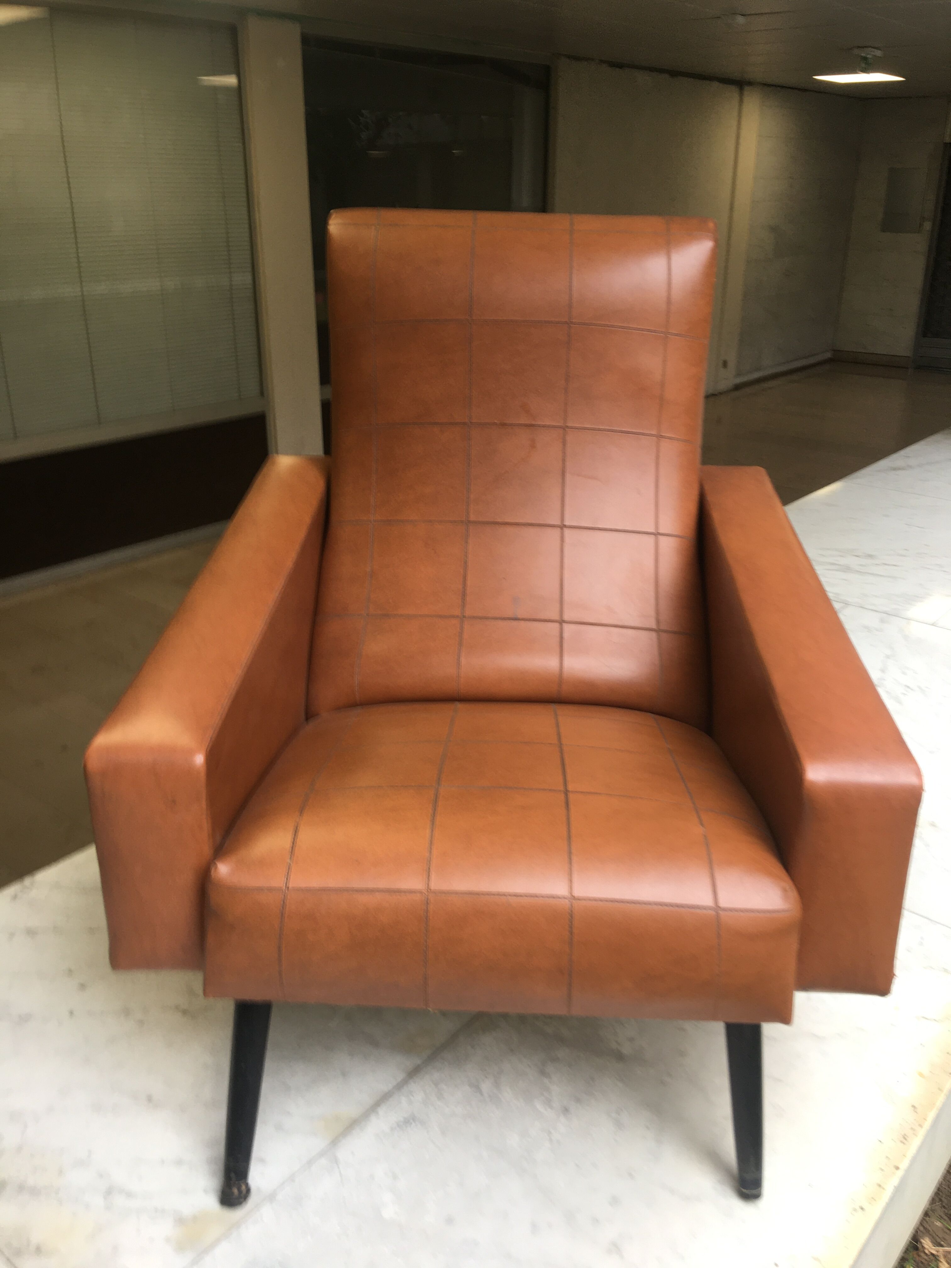 Brown skai armchair
