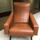 Brown skai armchair