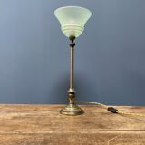 Ornate brass table lamp with mint green glass shade