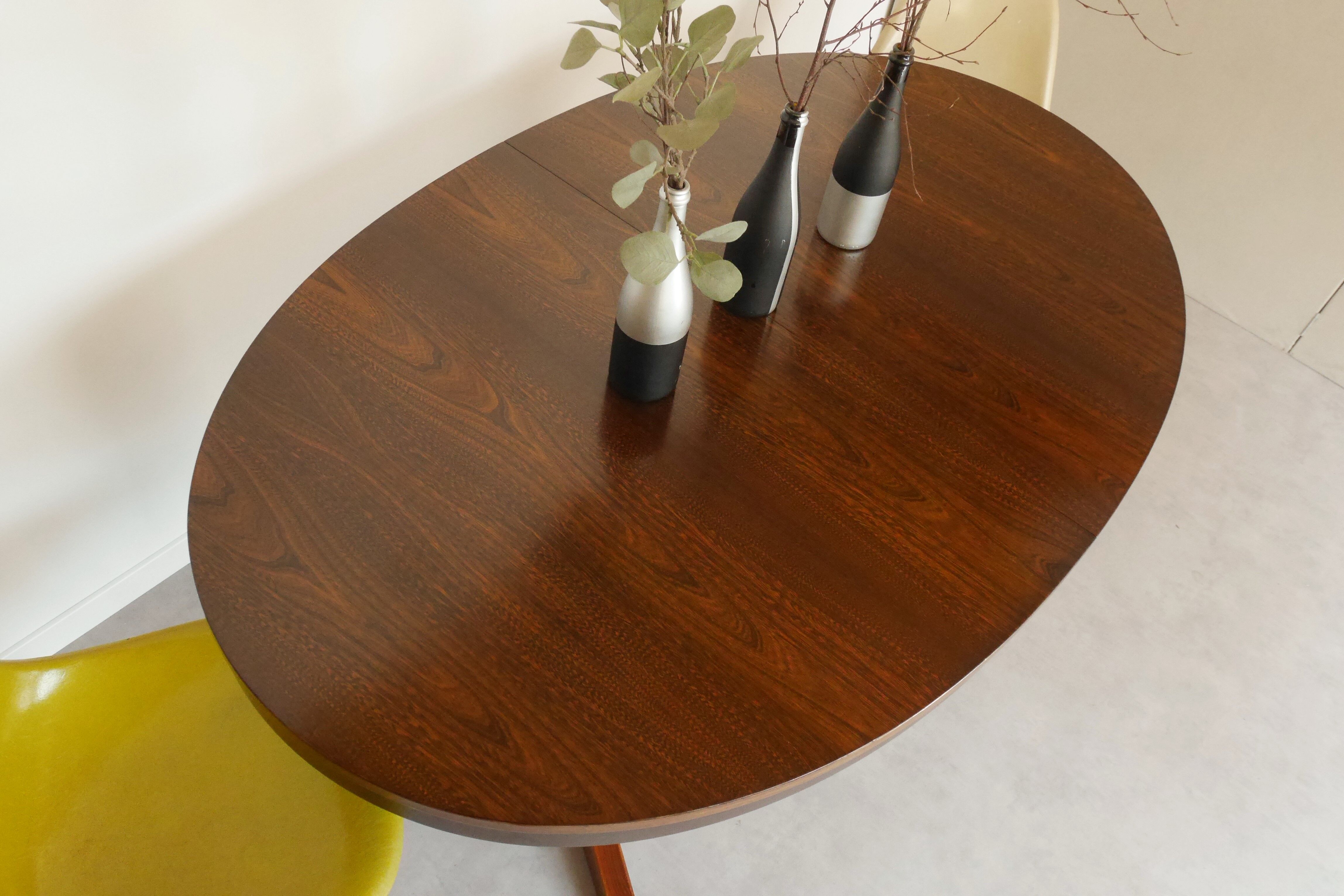 Scandinavian style oval table in central foot with extensions