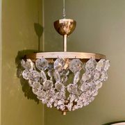 Crystal and brass chandelier pendants