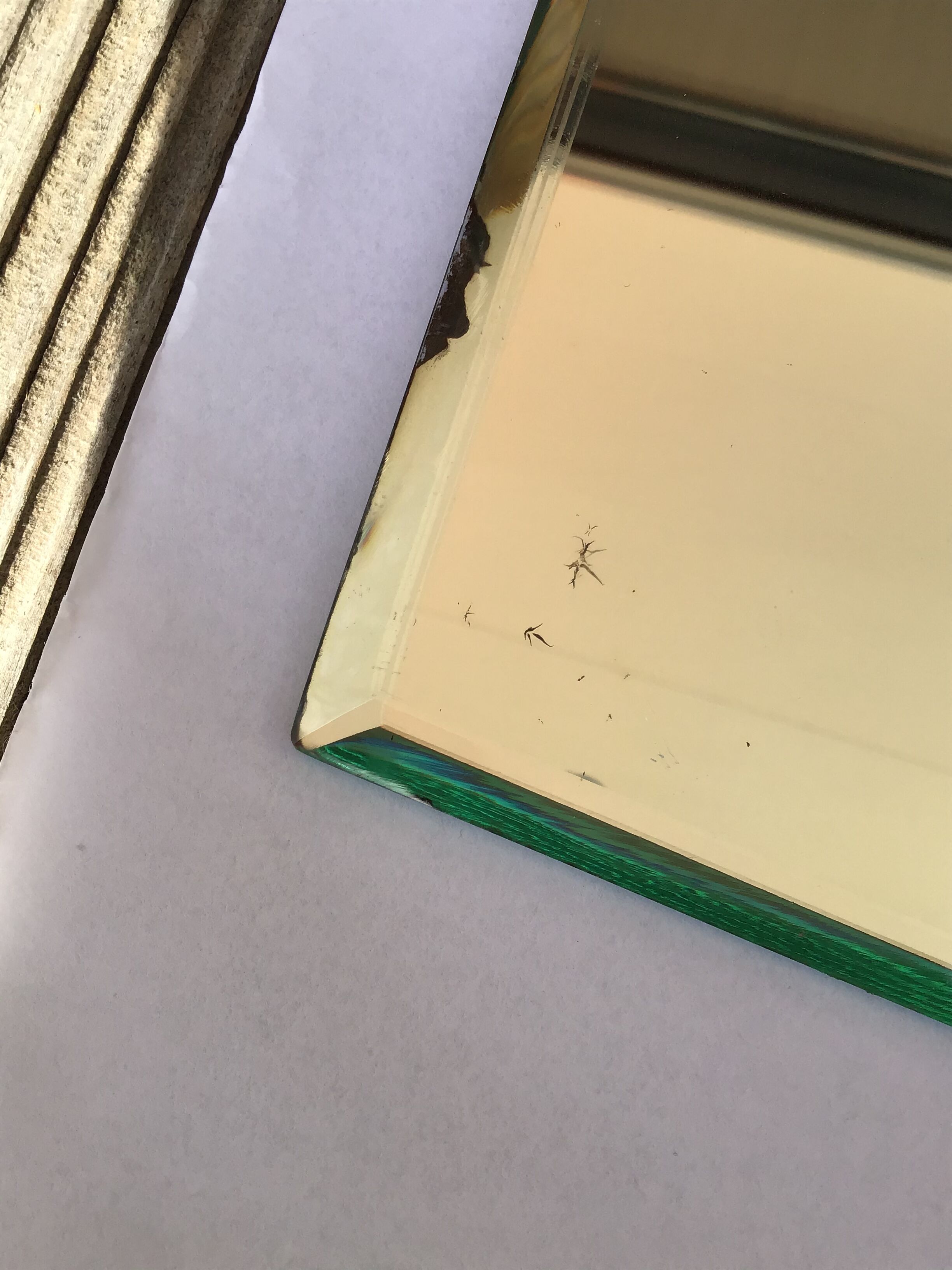 Bevelled mirror trapeze two waves at the top