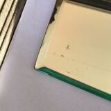 Bevelled mirror trapeze two waves at the top