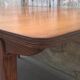 Extendable teak dining table