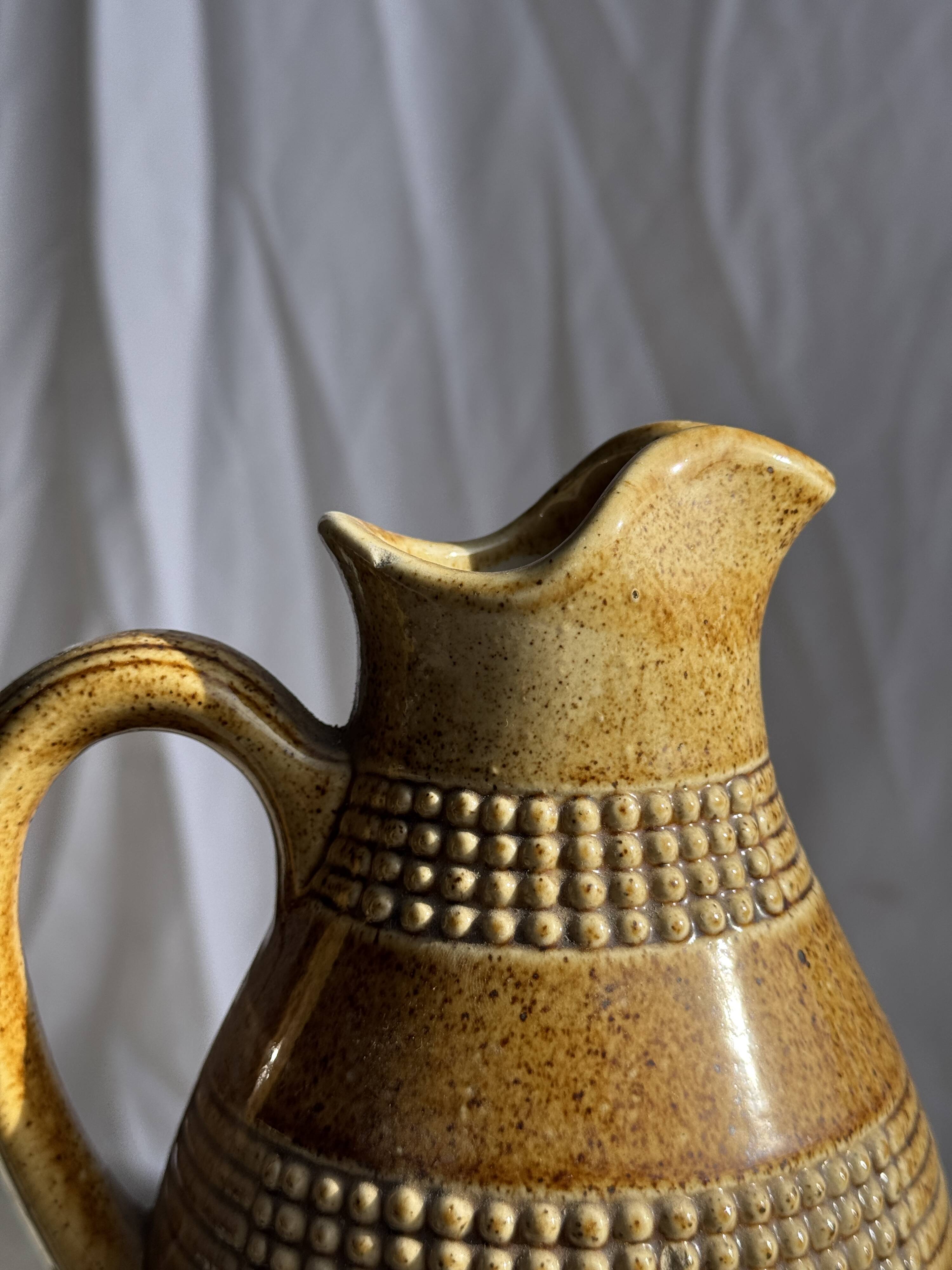 Vintage yellow stoneware carafe with beaded friezes Made in France H22