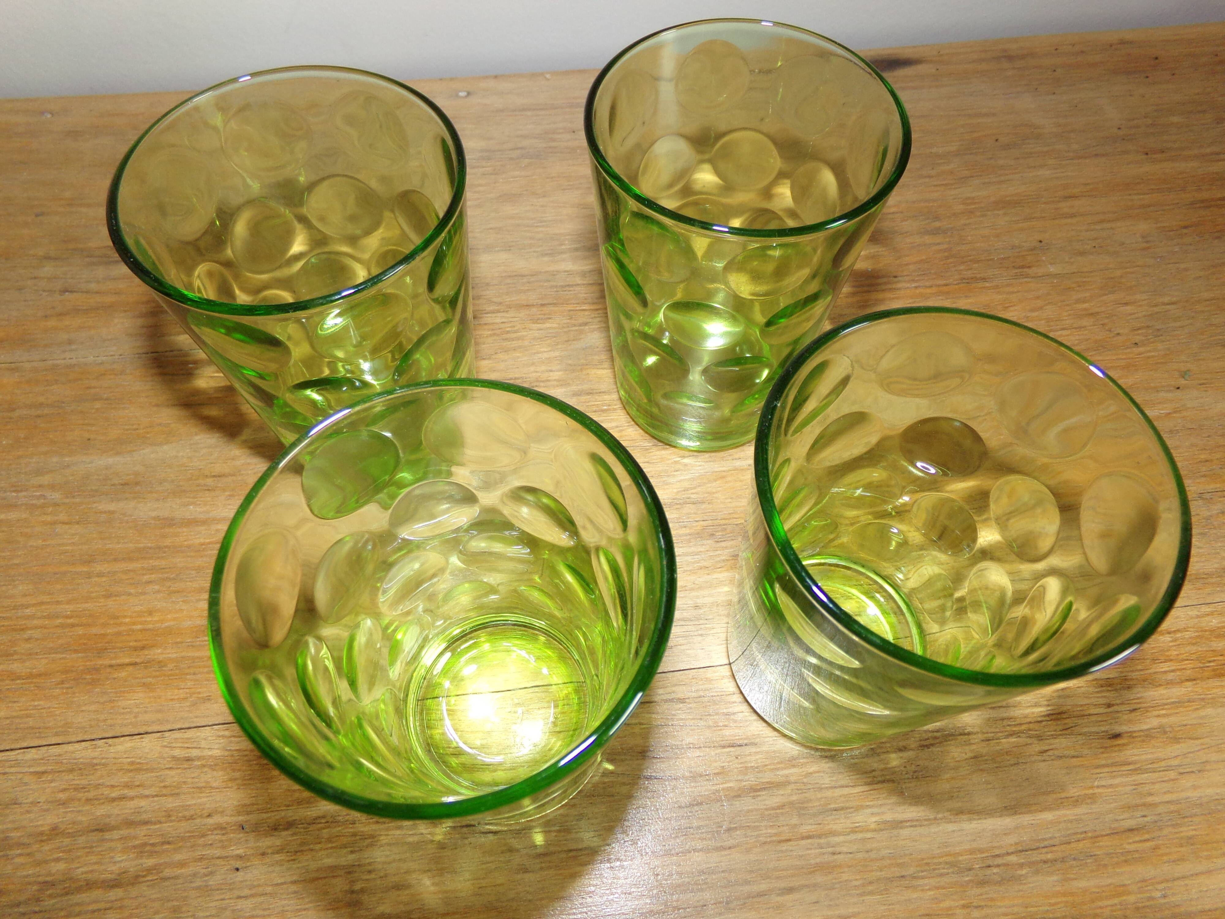4 old green glasses
