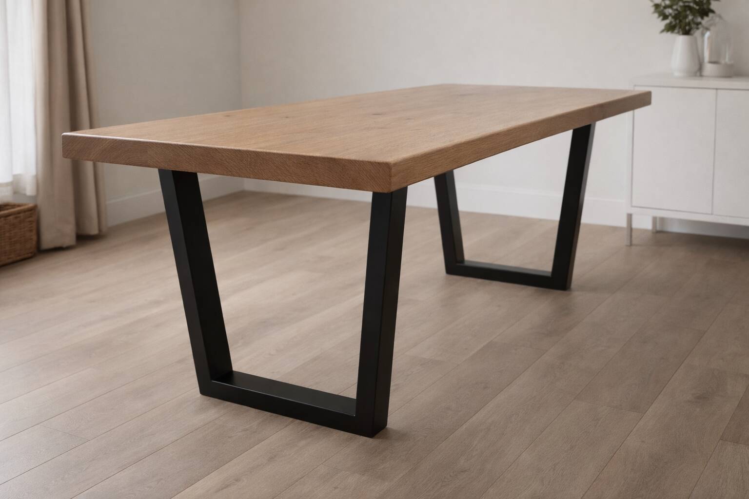 Modern table with metal legs and a natural varnished solid oak top