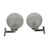 Pair of Inda chrome and glass globe wall lamps