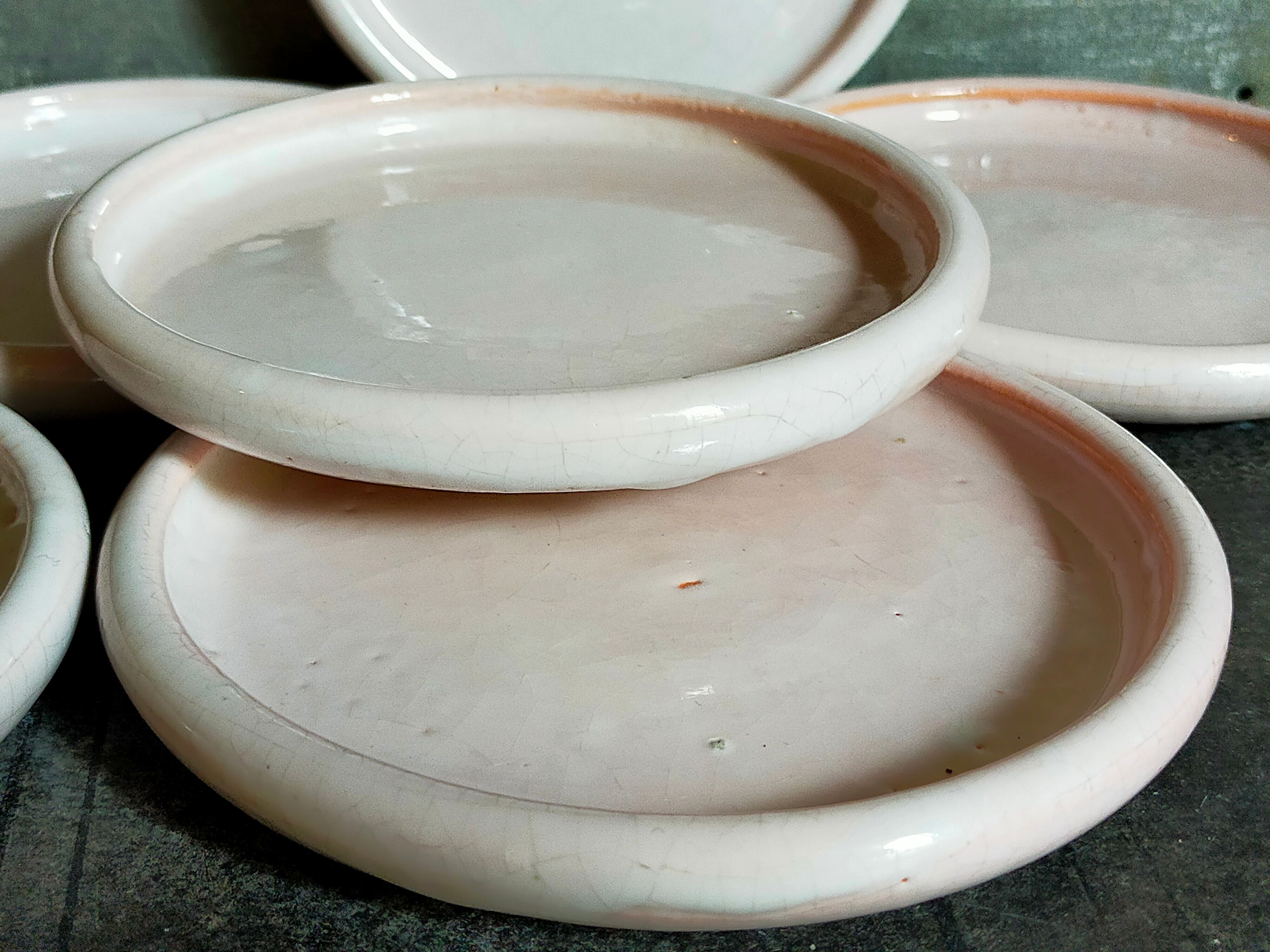 Six antique enamelled earth cut-cups