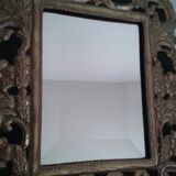 Mirror with embossed metal décor