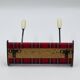 Vintage red Scottish coat rack from the 1970s.