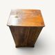 Small rustic antique bedside table made of solid wood.