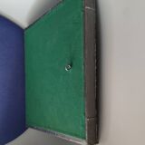 Tin mirror on brutalist wood support
