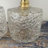 Set of two chiseled glass sconces