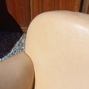 Pair of 1930s club armchairs in ivory leather.
