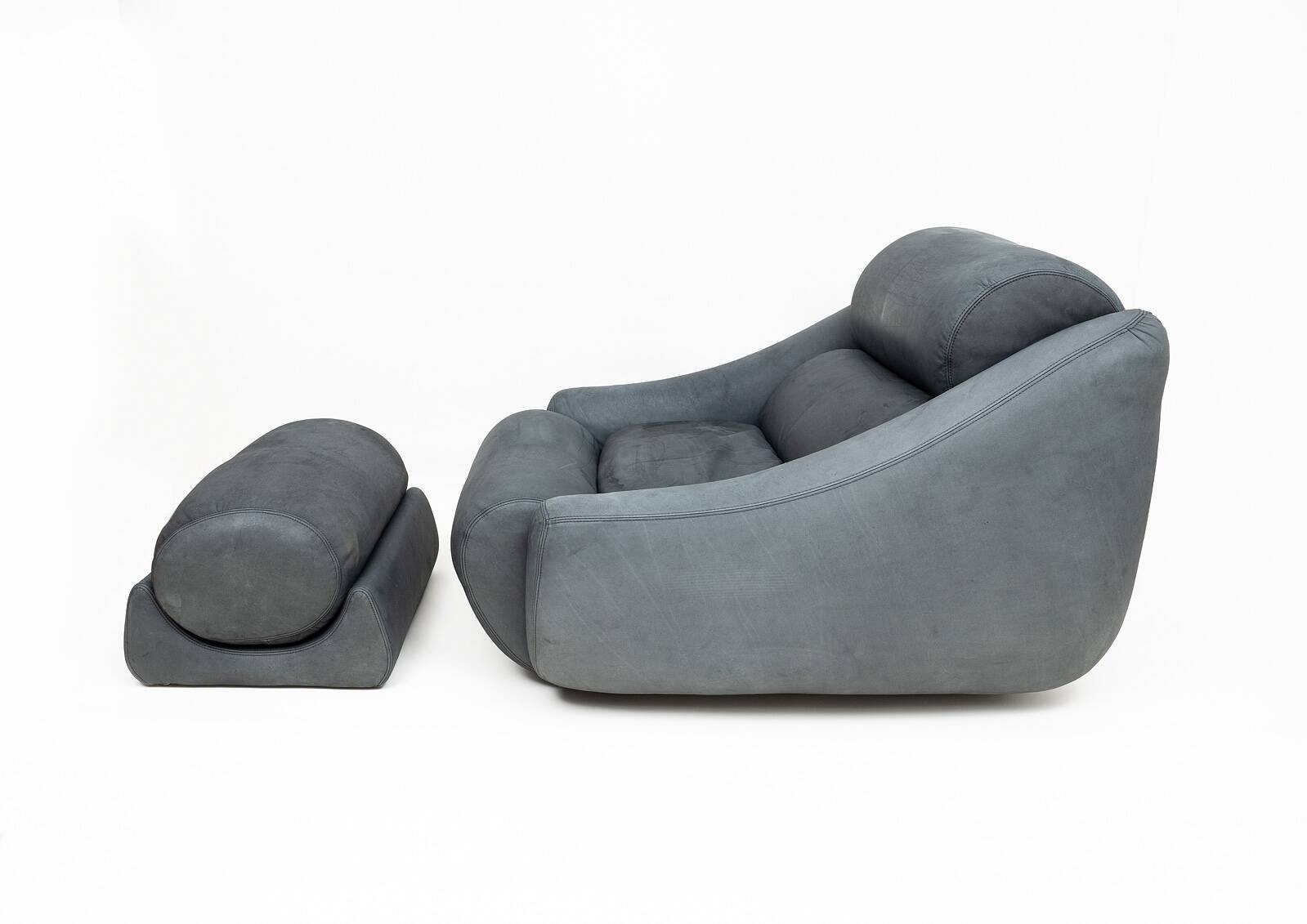 Large lounge chair and ottoman in leather, 1970