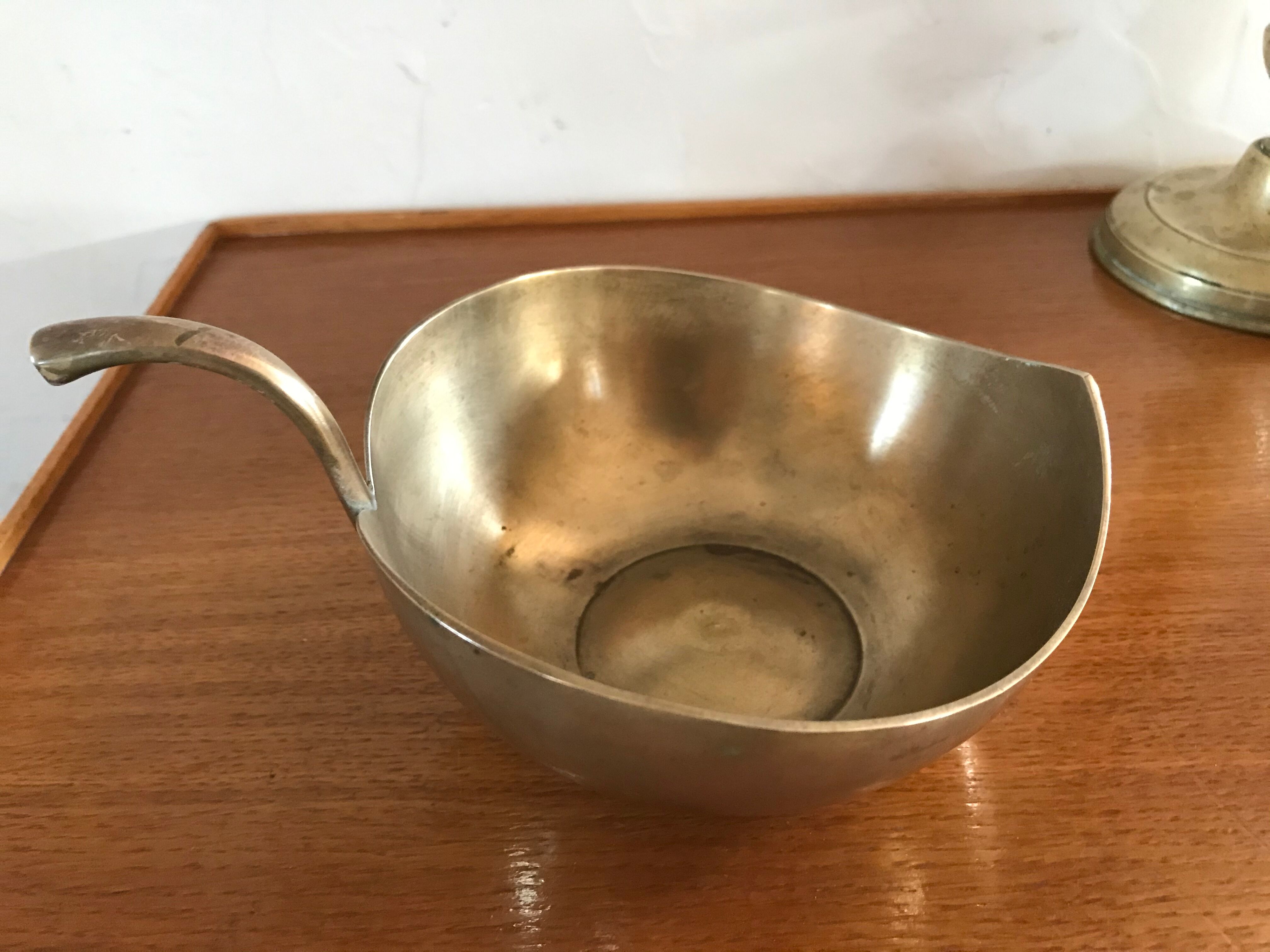 Empty brass apple pocket