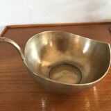 Empty brass apple pocket