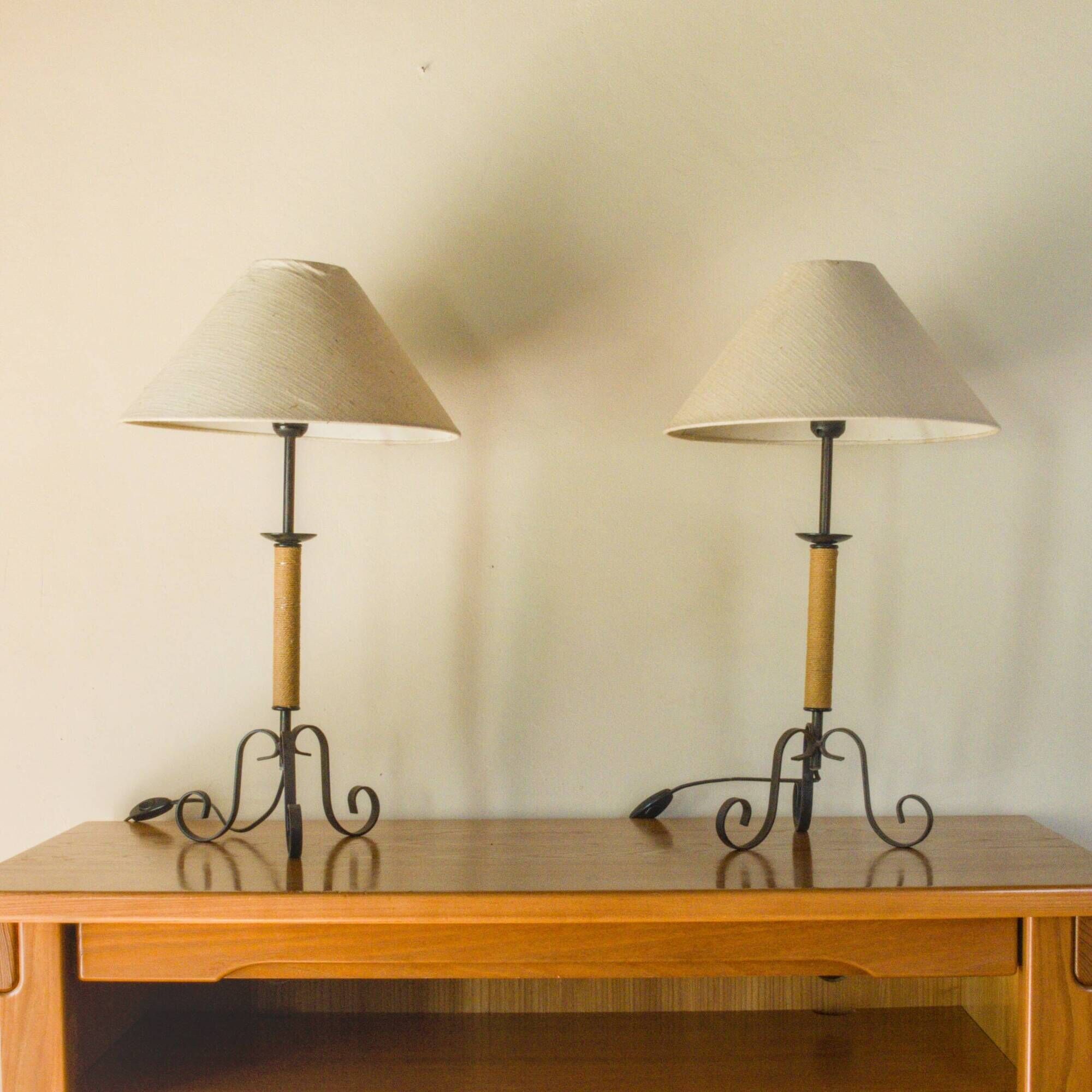 Pair of wrought iron and rope table lamps, adjustable lampshade.
