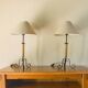 Pair of wrought iron and rope table lamps, adjustable lampshade.