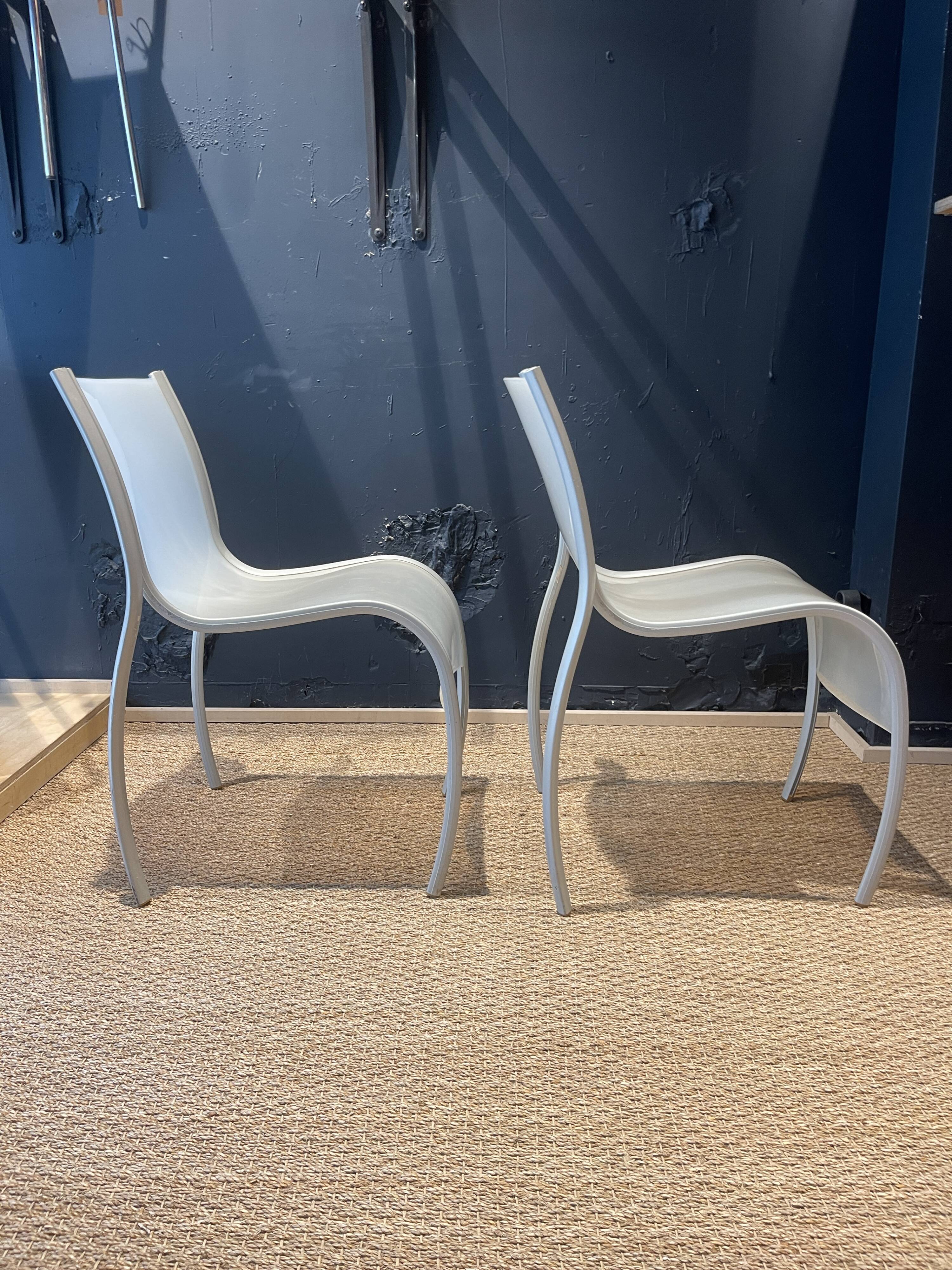 Pair of fpe chairs by ron arad for kartell translucent gray italy