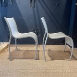 Pair of fpe chairs by ron arad for kartell translucent gray italy