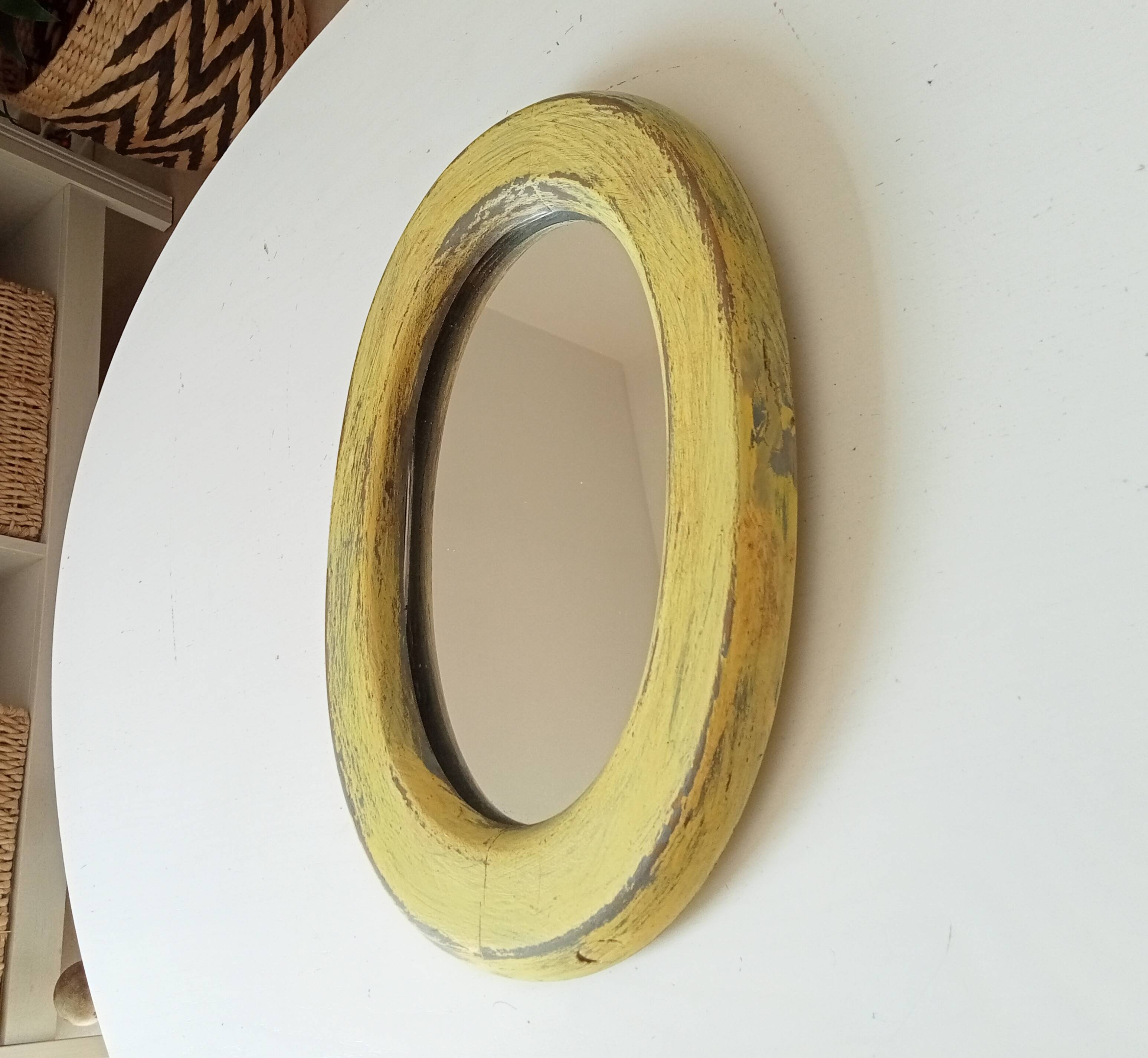 Small antique oval mirror