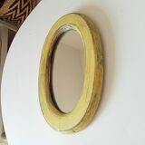 Small antique oval mirror