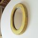 Small antique oval mirror
