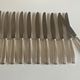 Set of 11 knives Christofle Alfénide Saturn modernist silver metal