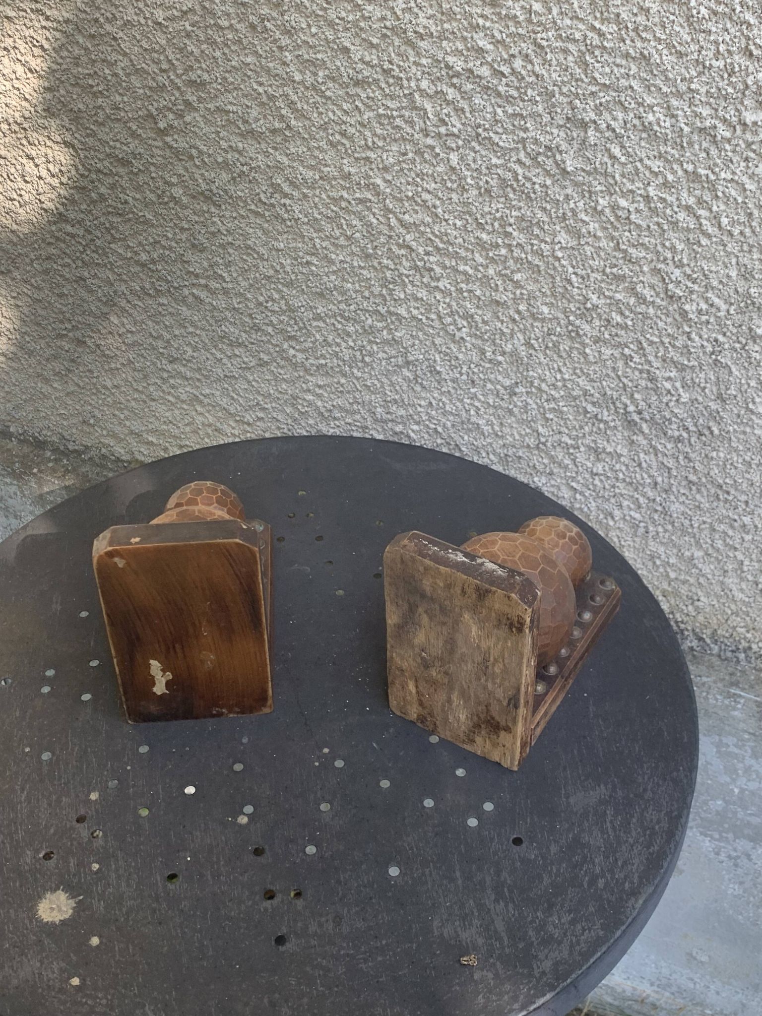 Pair of vintage carved wood and metal ball bookends