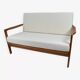 1960s canapé, in teak and white boucle.