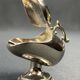 Individual ashtray with metal clasp