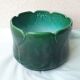 Green ceramic cache-pot