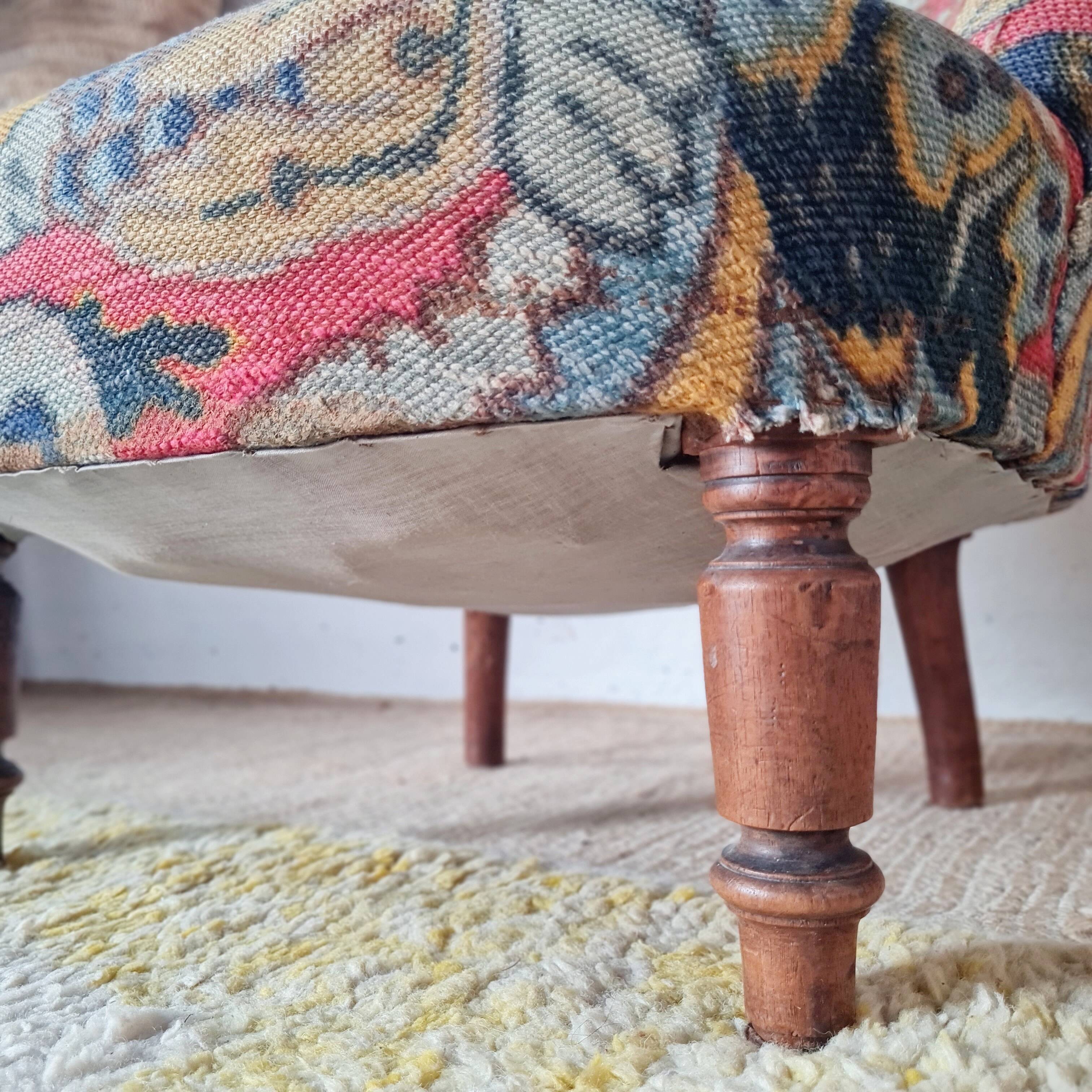 Small "madame" toad chair, vintage, upholstered in multicoloured floral fabric.