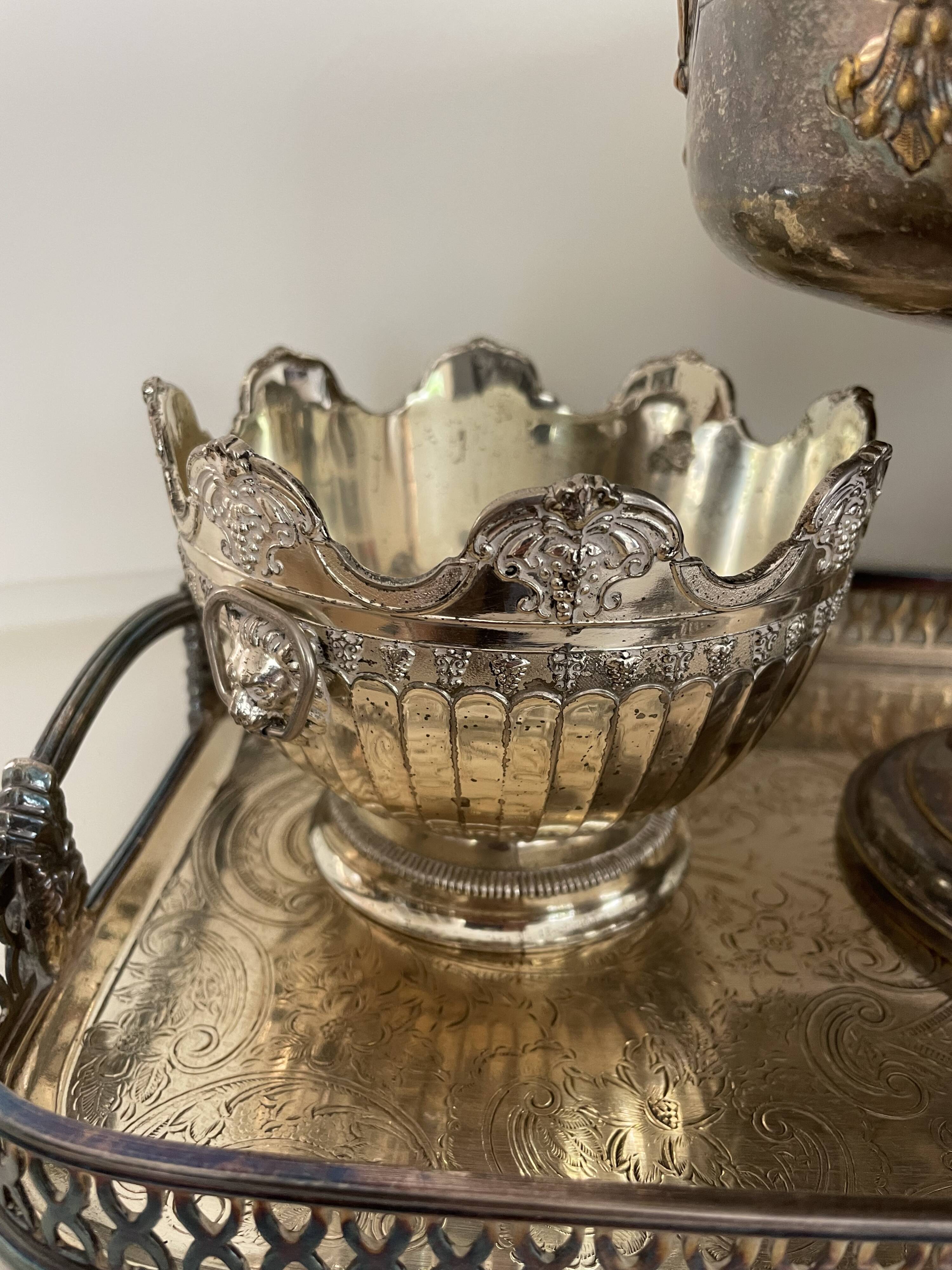set of 3 silver metal chisel bowls with their tray