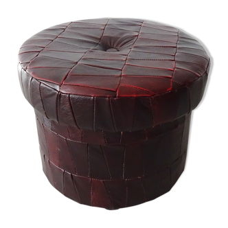 Tabouret en cuir patchwork rouge sur roulettes