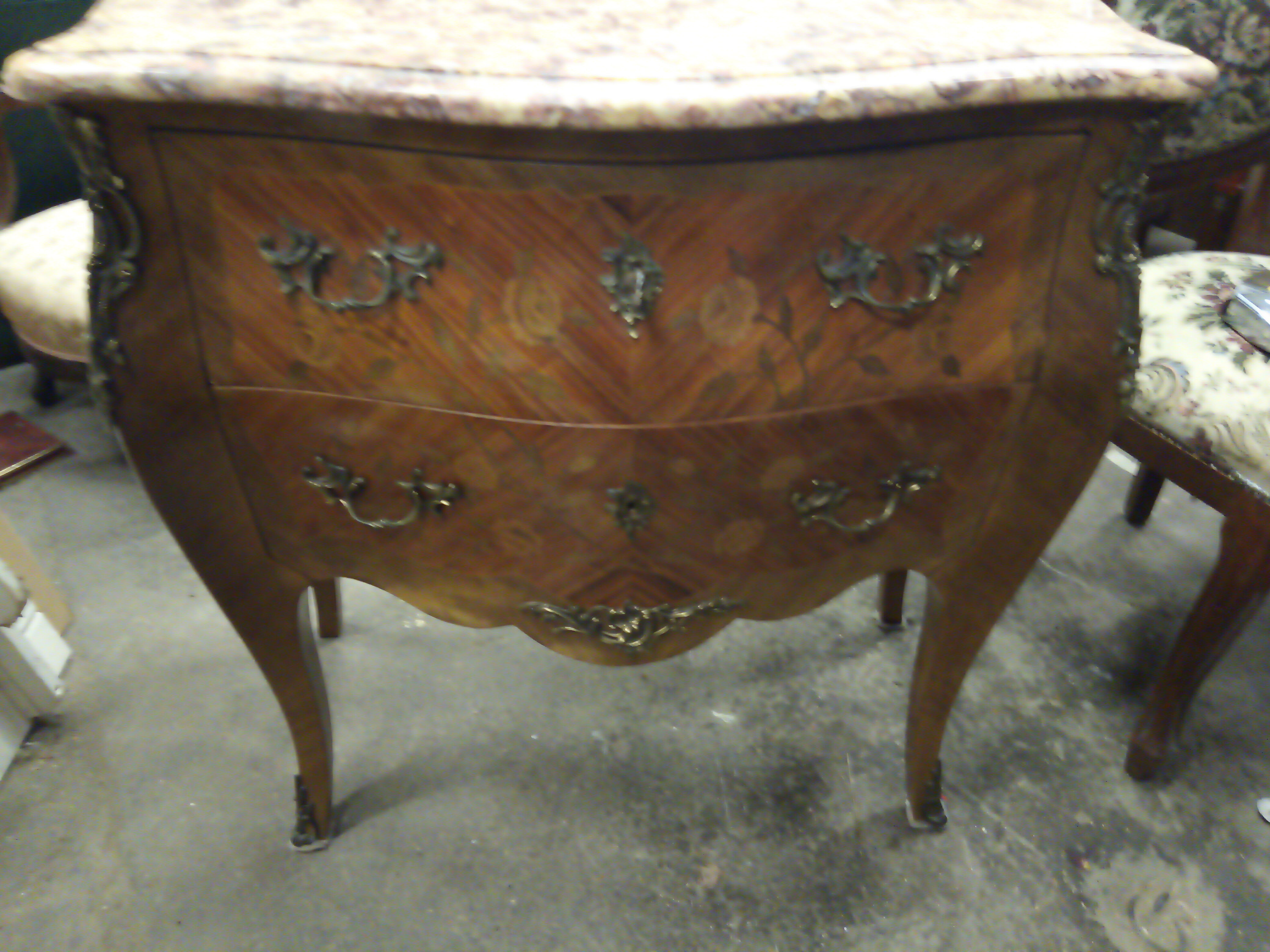Comfortable curved Louis XVI style rosewood marquetry