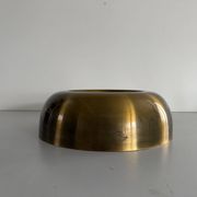 Flush-mounted disc-shaped brass fixture from the mid-century, 1960, Italy.