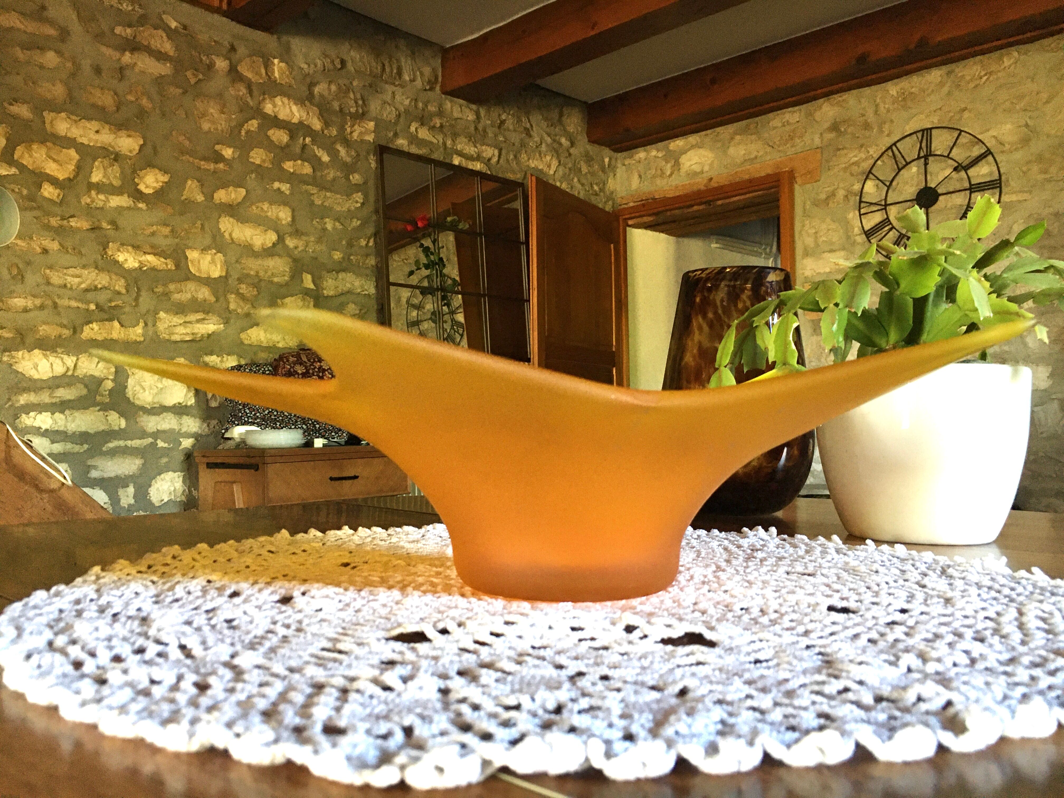 Star in orange glass paste