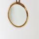 Round wall mirror in gilded wood, mid-century, C. Allodi & G. Subelli, Italy, 1950s.