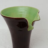Brown and green vase with open edge rolled up