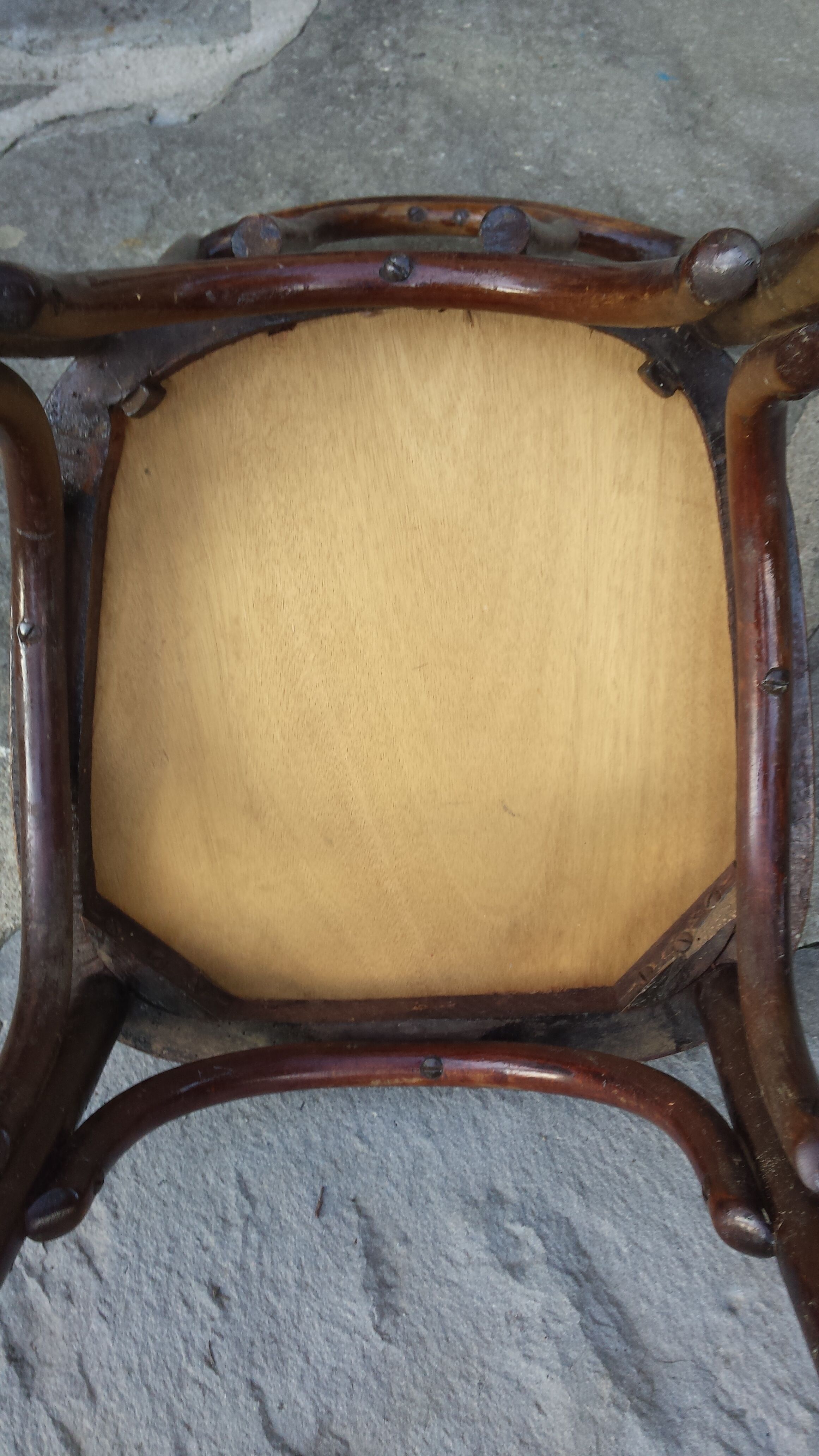 Bistro chair with buchon brand plate