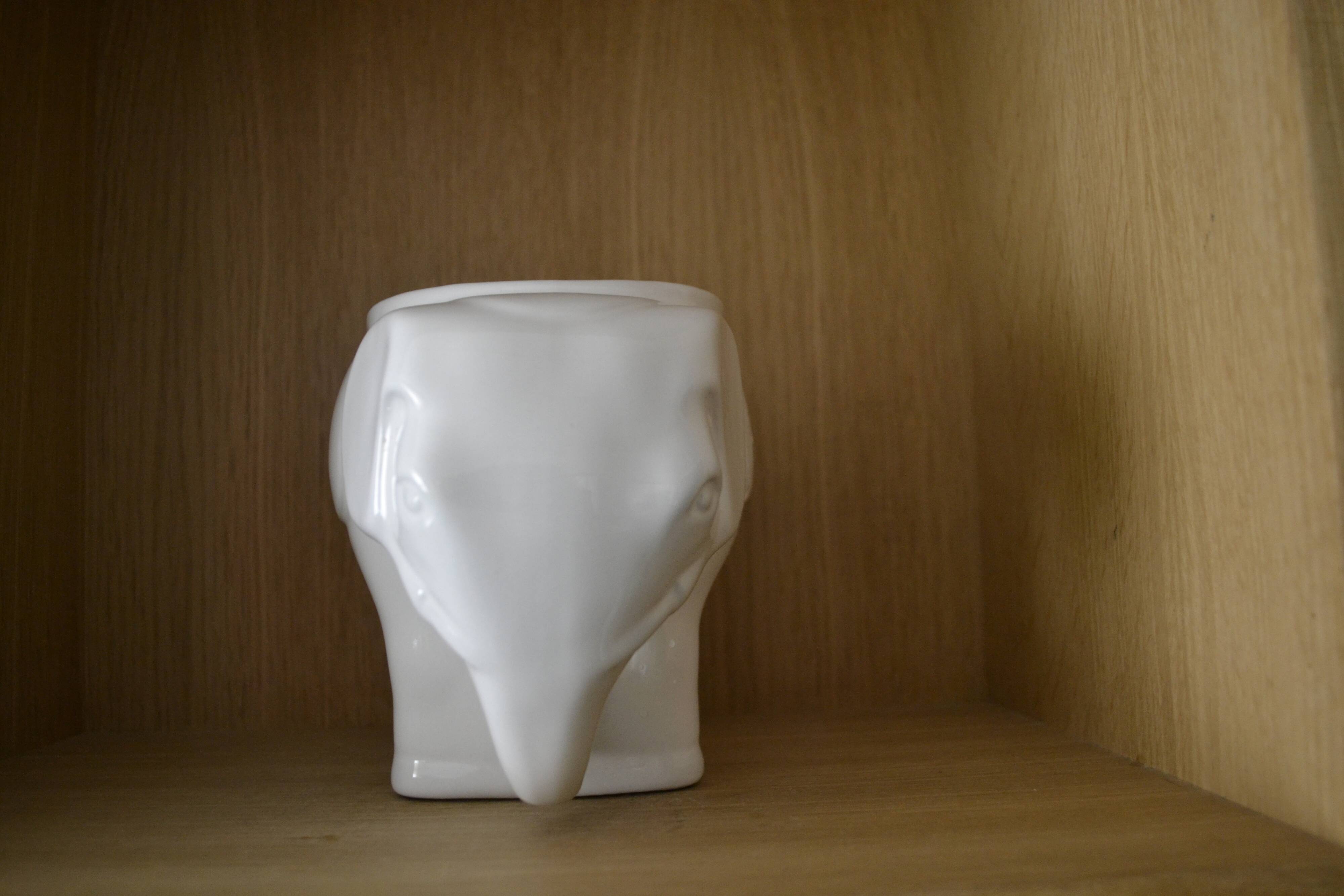 White elephant pot cover