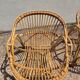 Rattan lounge with two armchairs and a vintage 1950s bench.