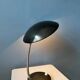 Small black metal desk lamp in Bauhaus style.