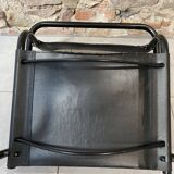Armchair in black lacquered metal