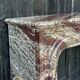 Cheminée de style Louis XIV en marbre Campan Rubané