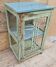 Art Deco glass-fronted bar cabinet in teak